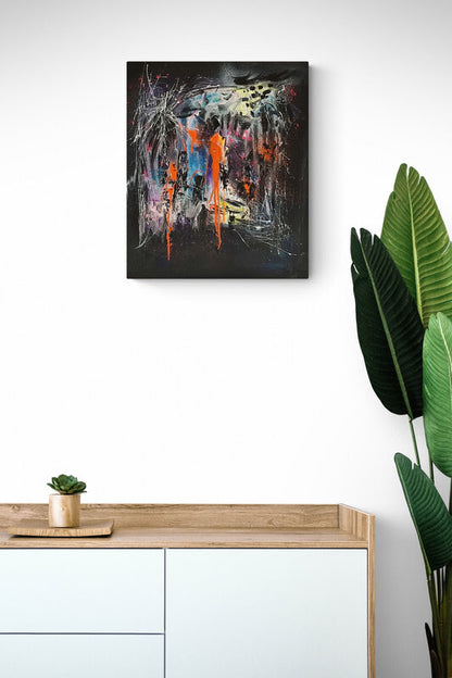Black and orange abstract painting in interior