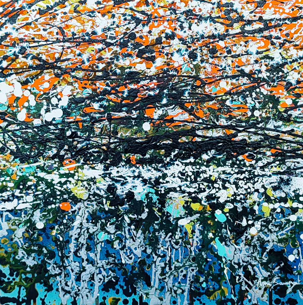 Close-up of the colourful dripping paintwork in this abstract artwork