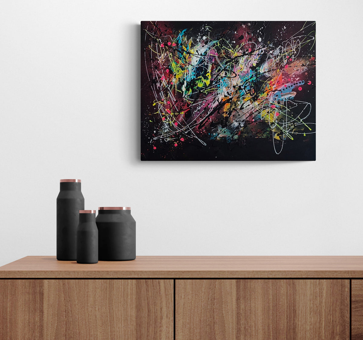 flashy-multicoloured-abstract-painting-on-black-background-and-design
