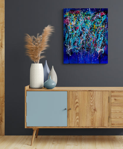 L’éclate totale blue abstract painting displayed in a contemporary interior
