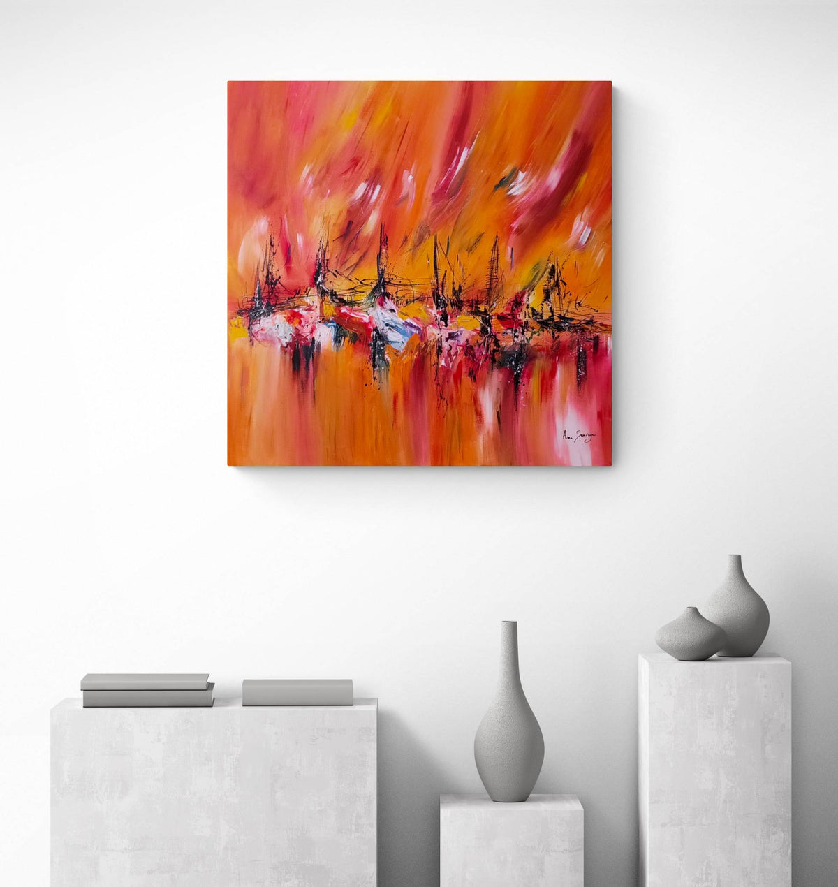 Warm red abstract painting displayed in a modern interior