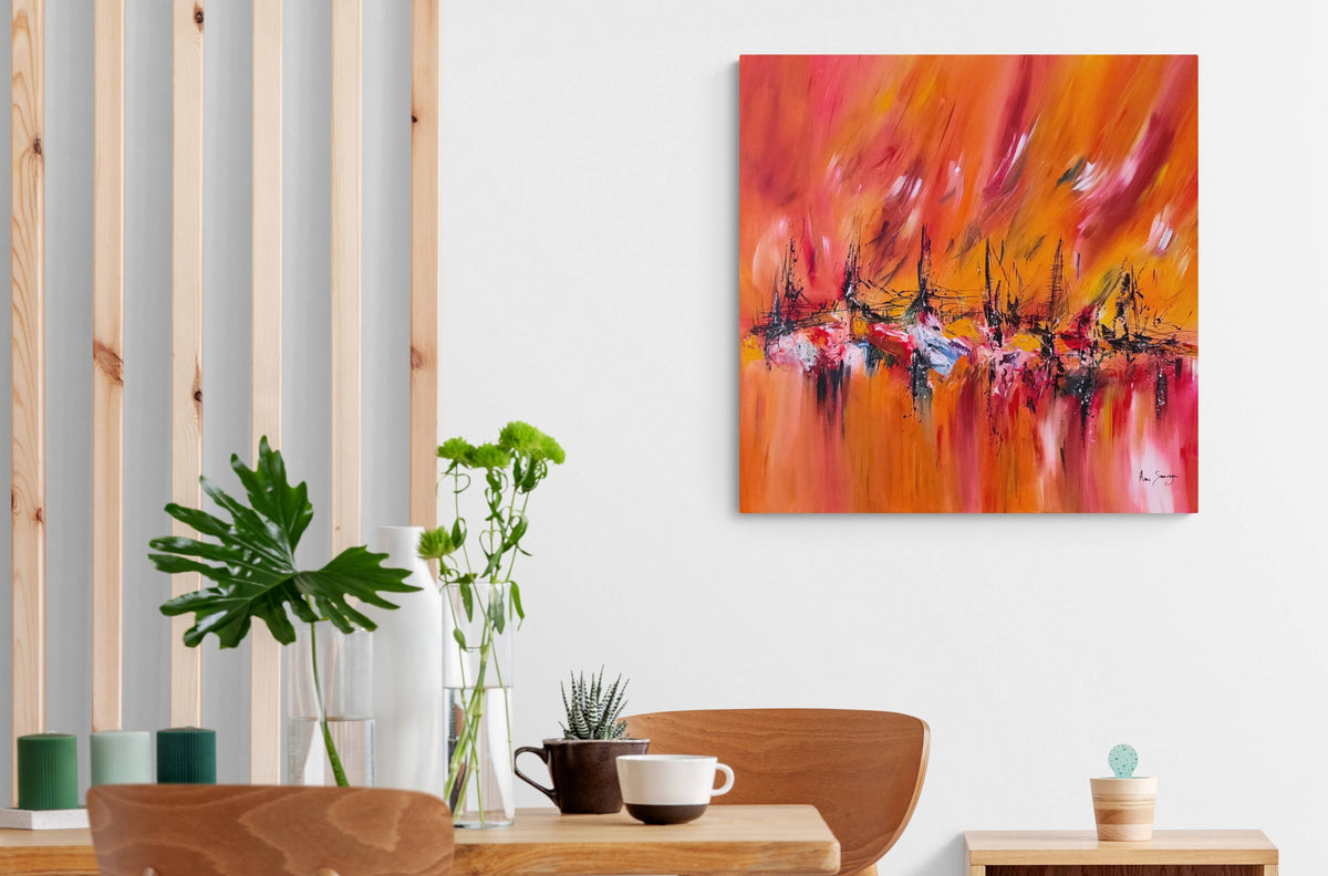 Warm red abstract painting displayed in a modern interior