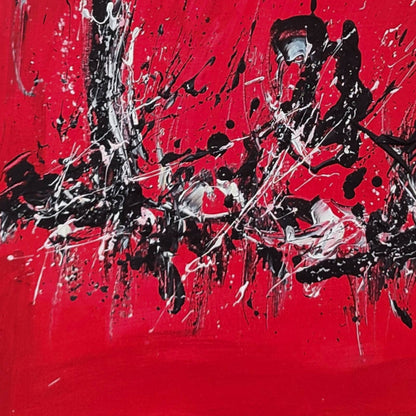 Detail of a red black and white abstract painting with expressive marks