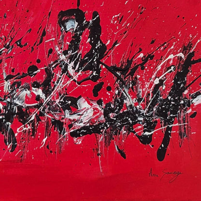 Detail of a red black and white abstract painting with expressive marks